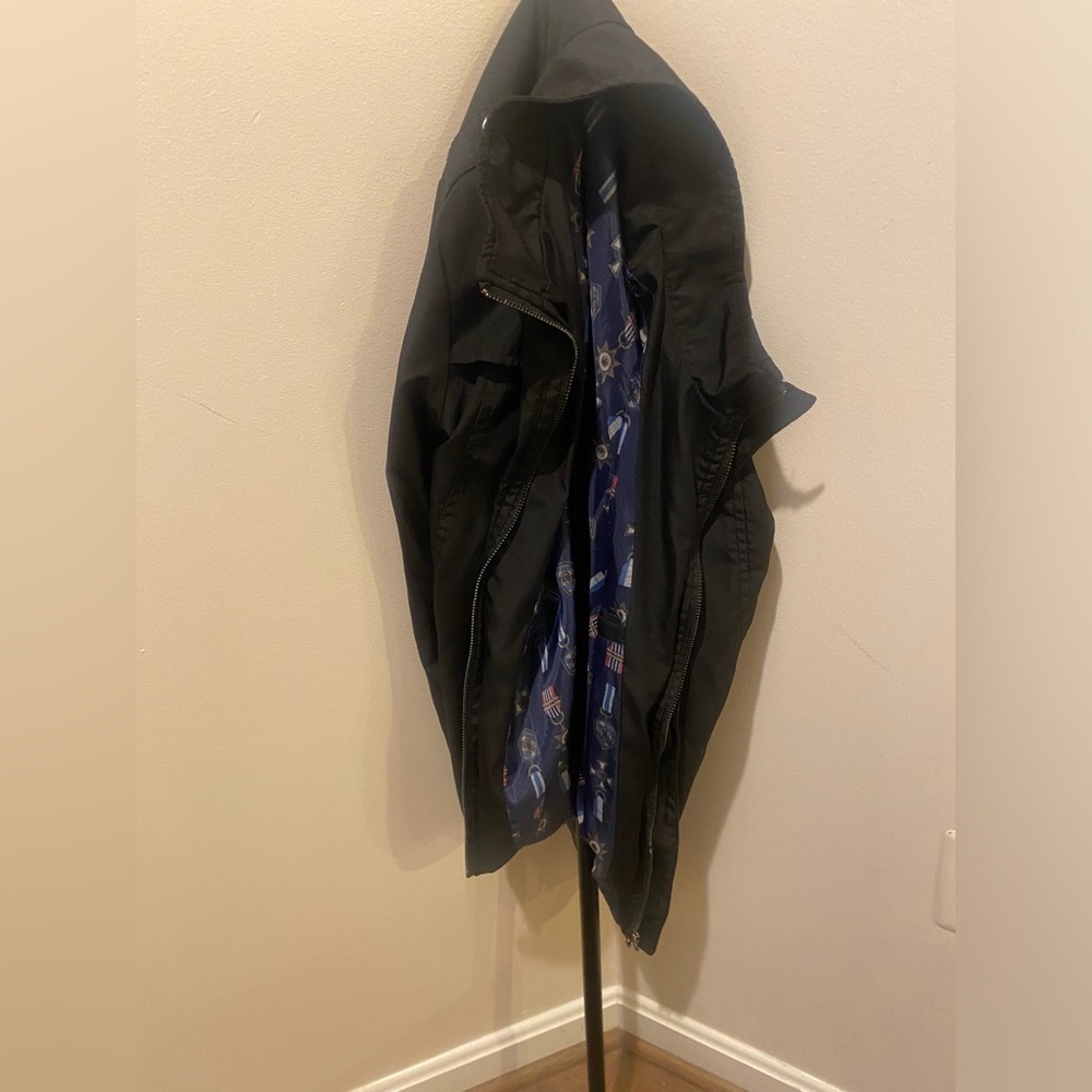 Nice fall jacket.  Never worn.   Ordered years ago.  Nice and sanitized